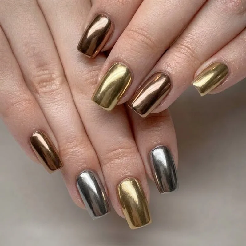 Bronze and pewter gold chrome manicure on square nails showing warm winter metallic finish
