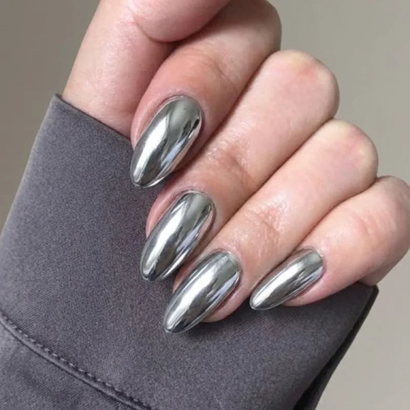 Full mirror chrome silver manicure, a metallic winter nail idea with high shine finish