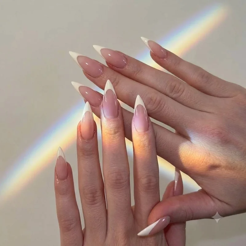Sheer milky pink nude French manicure, a simple everyday winter nail idea for 2026