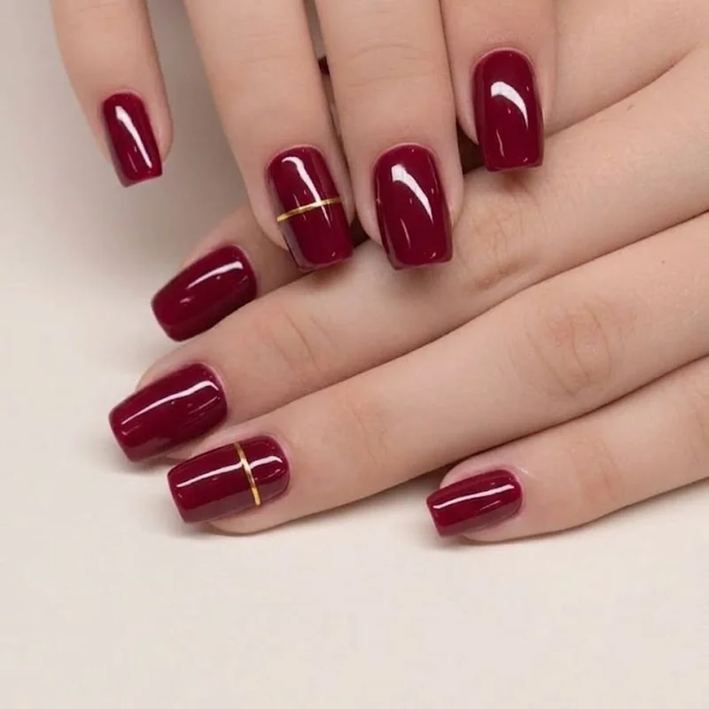 Short square nails with clean single color finish and micro accent for winter