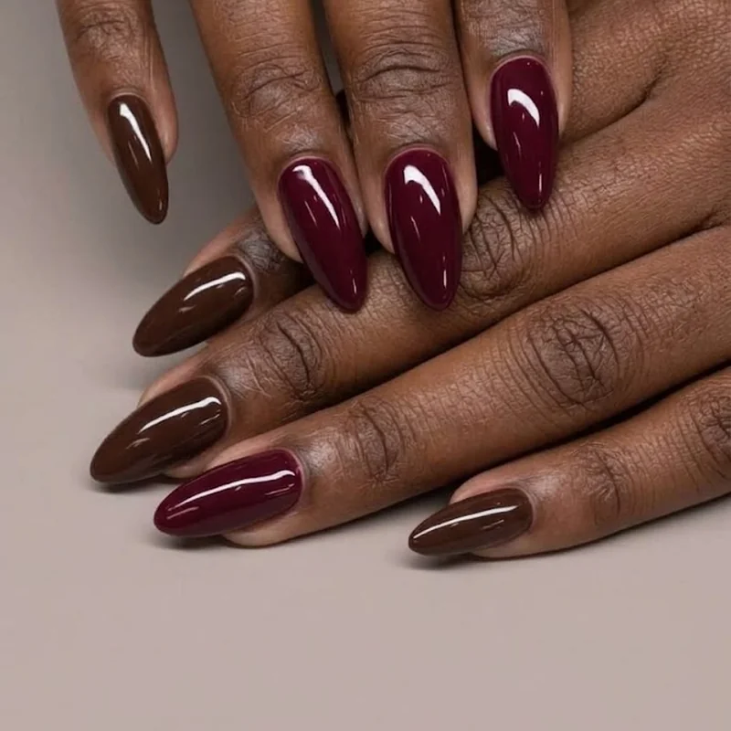 Rich chocolate brown and burgundy winter nail colors for dark skin as a high-saturation alternative