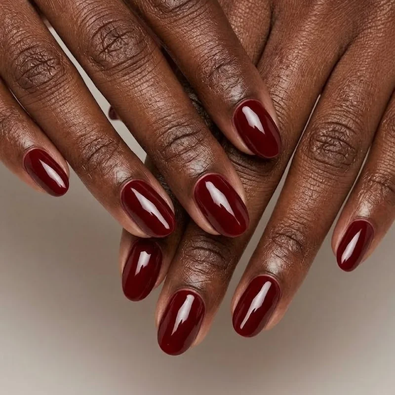Glossy long-lasting winter nail color for dark skin with healthy cuticle care and finish