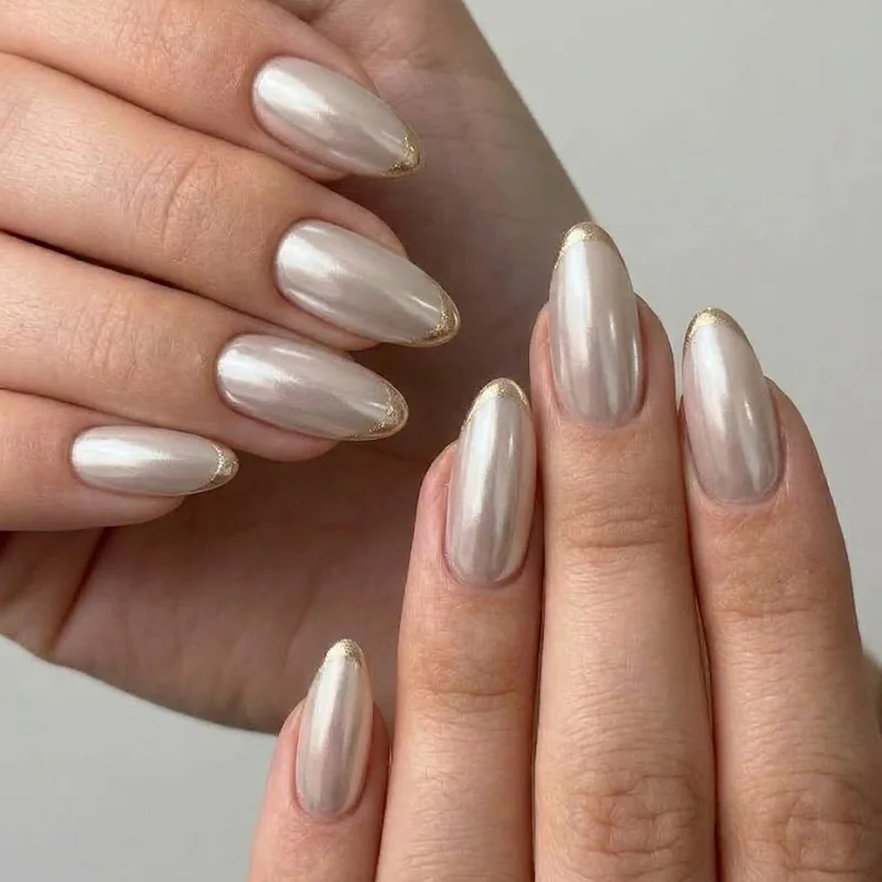 Pearl chrome winter wedding nails with delicate micro-French tips on almond shape
