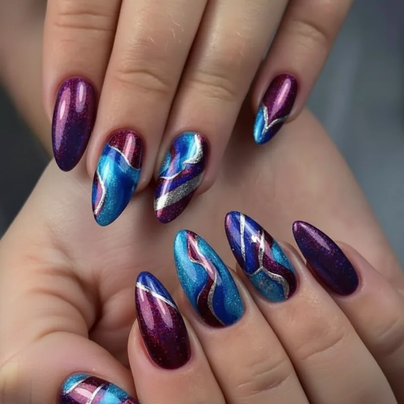 January garnet and February amethyst Aquarius birthstone nail colour palette showing electric blue silver periwinkle and violet chrome options