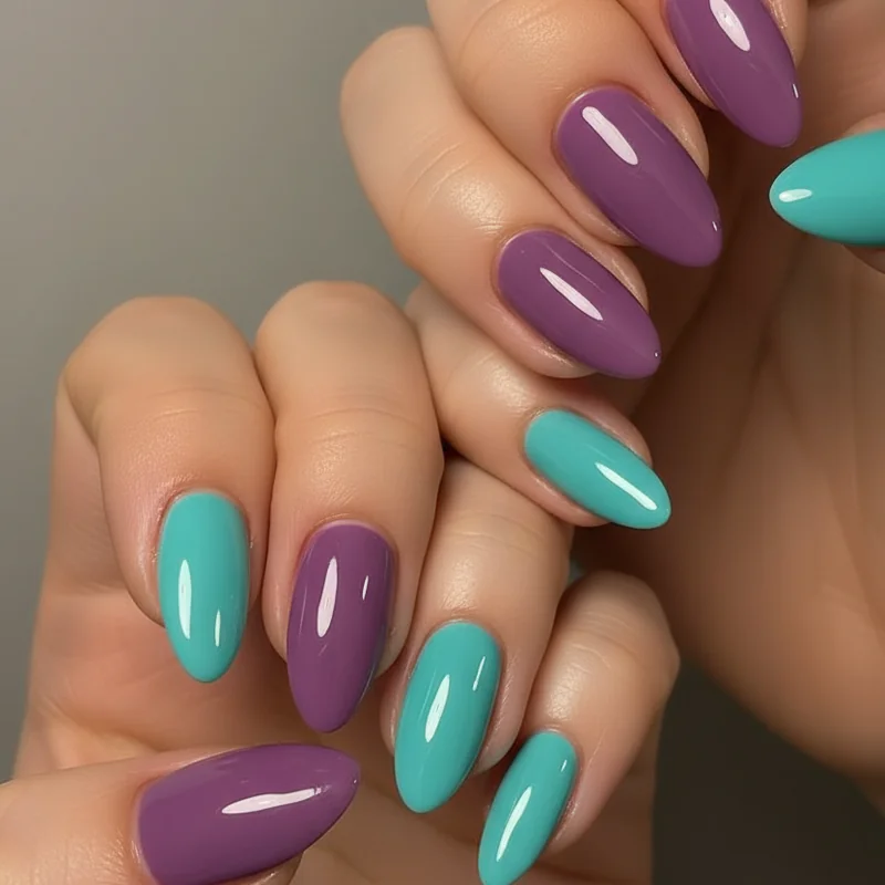 February Pisces amethyst violet nails beside March Pisces aquamarine teal showing distinct birthstone palette birthday nails