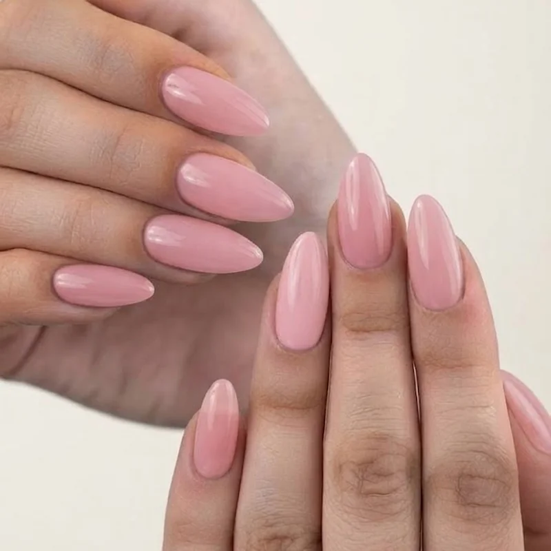 Sheer pink jelly gel nails with a glossy translucent candy finish