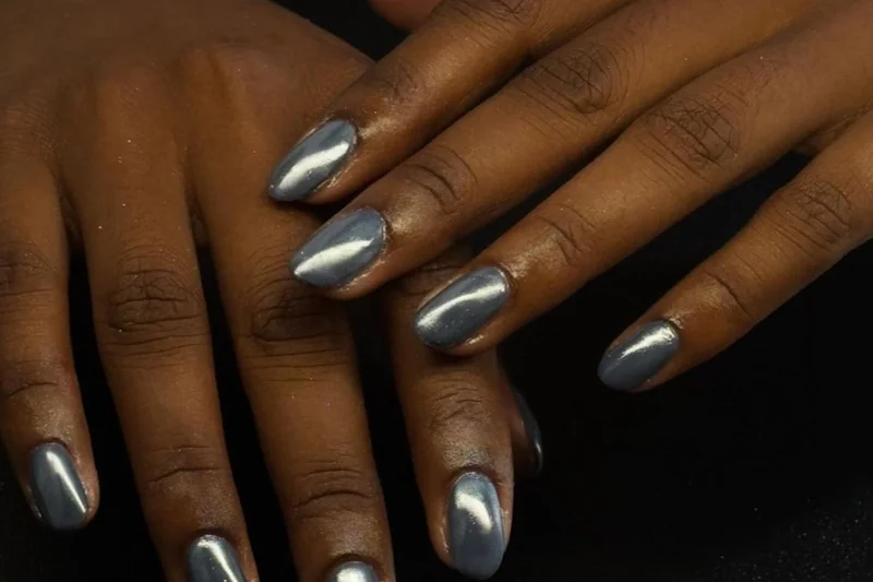 Aluminum foil wrapped around fingers with acetone soaked cotton pads for easy glitter nail polish removal technique
