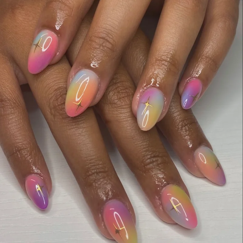 Aura nails using eyeshadow and makeup sponge showing gradient trendy effect achieved at home DIY