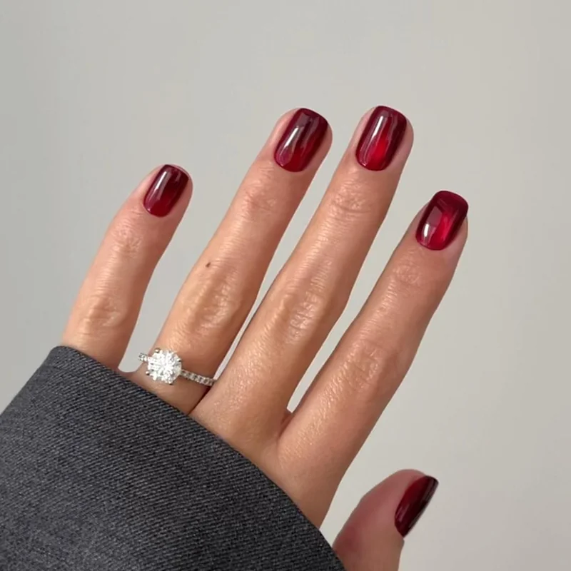 Deep burgundy short professional nails for winter office work elegant workplace manicure corporate setting