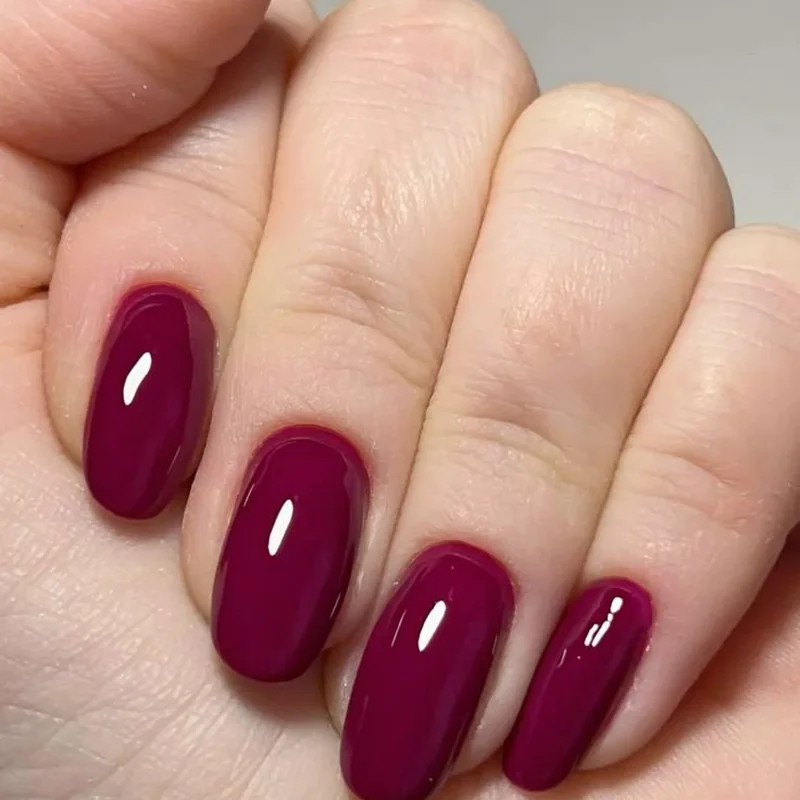 Fair cool undertone skin wearing jewel tones berry shades sapphire burgundy mauve nail polish colors