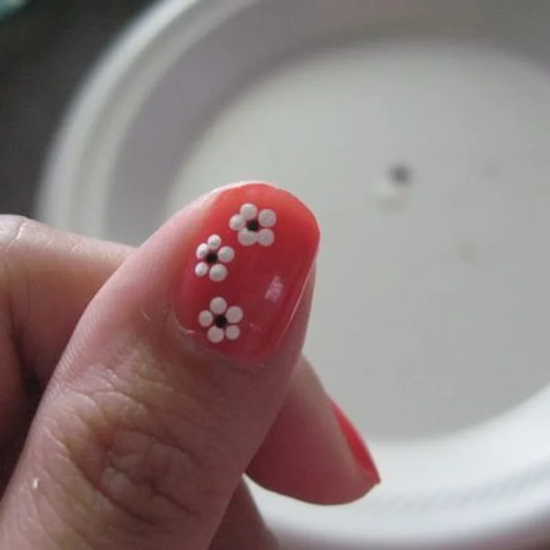Five dot flower nail art using toothpick method viral TikTok tutorial simple floral design for beginners