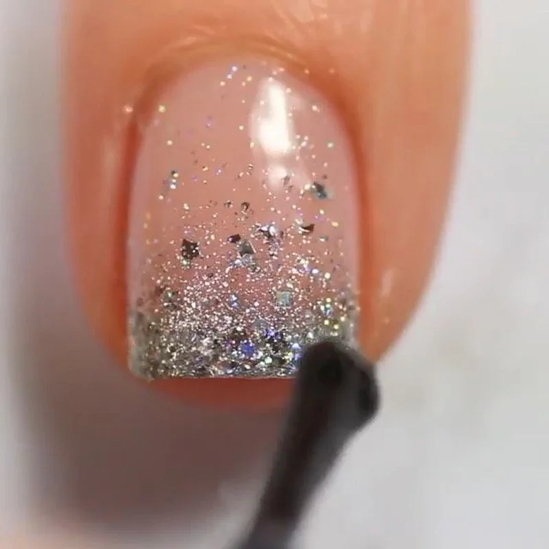 Glitter gradient using makeup sponge method ombre sparkle effect beginner friendly nail art tutorial