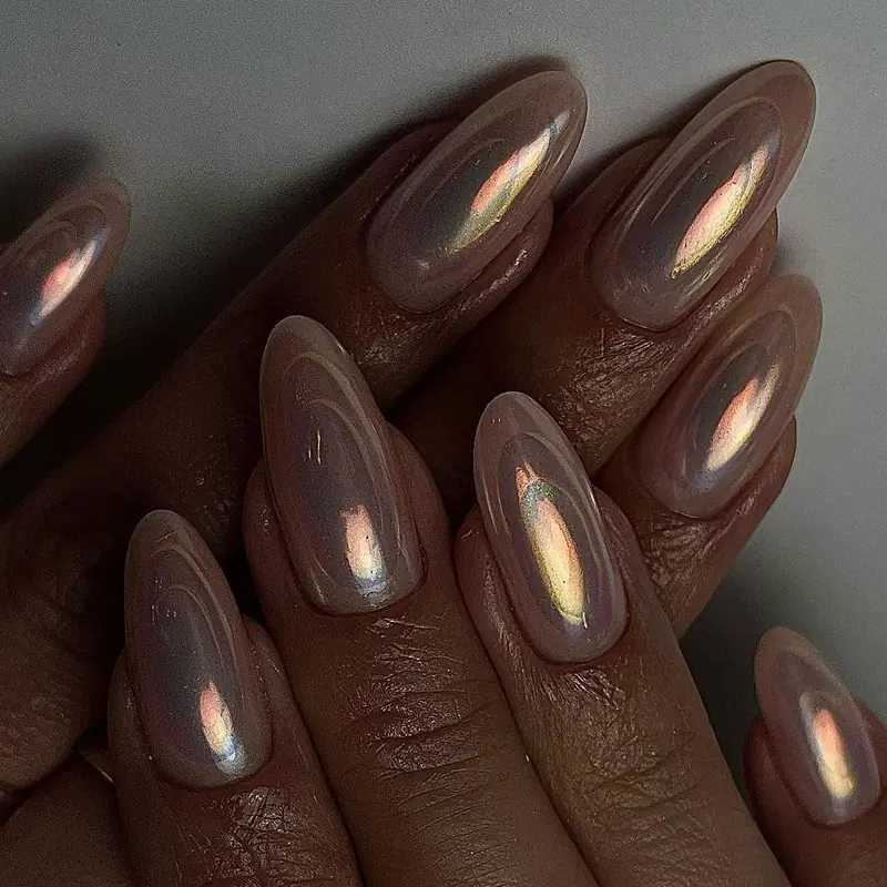 Metallic eyeshadow creating chrome nail effect DIY alternative to expensive chrome powder technique