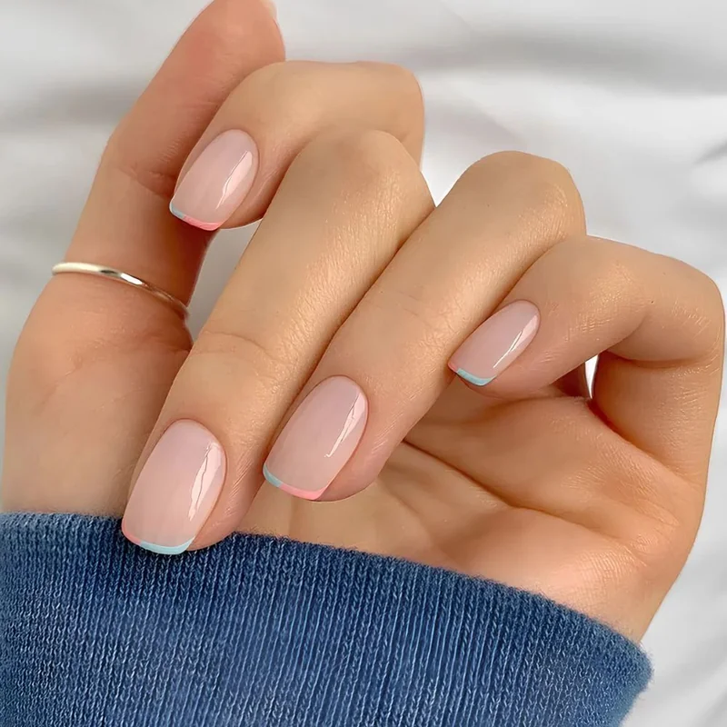Micro French tips with thin delicate line modern 2026 minimalist nail trend beginner friendly design