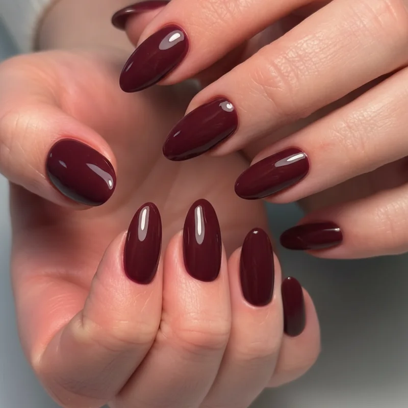 Deep burgundy short professional nails for winter office work elegant workplace manicure corporate setting