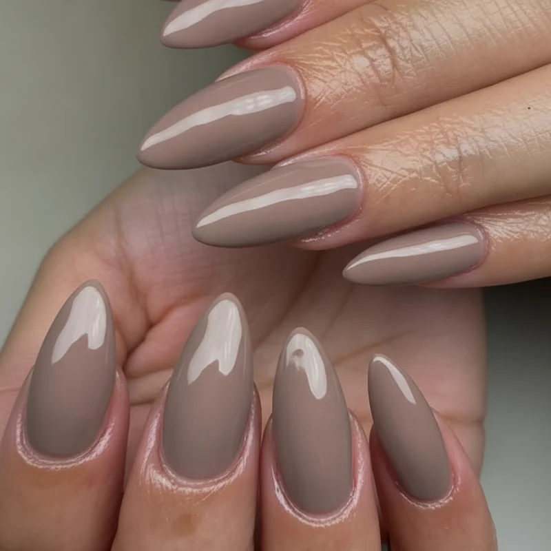 Finance professional showing conservative neutral nail colors office banking workplace appropriate short manicure