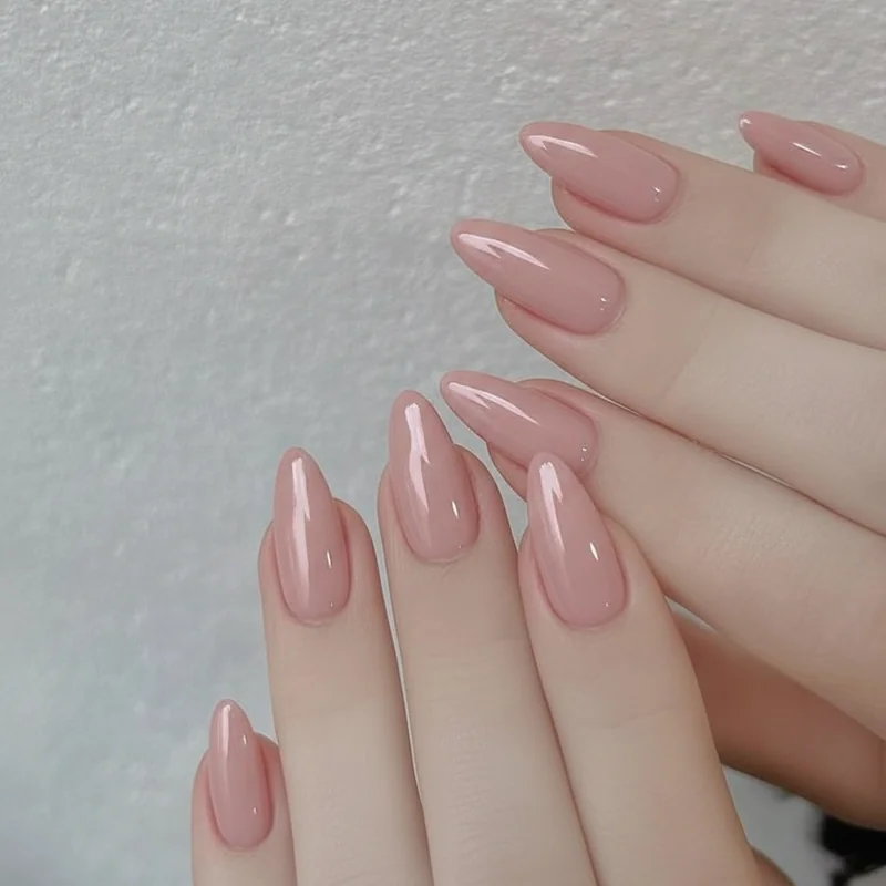 Professional woman at job interview with neutral nail polish conservative office appropriate first impression manicure