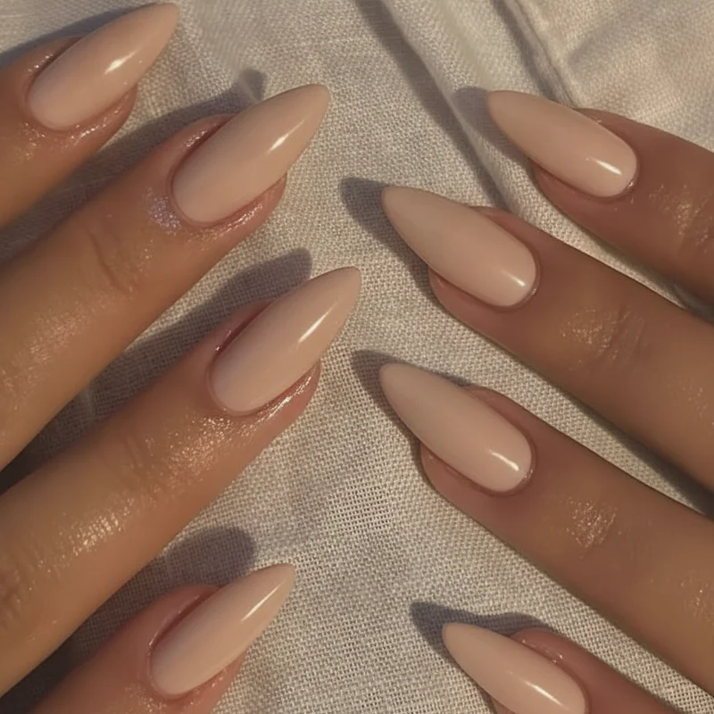 Professional neutral nail colors including nude beige soft pink and taupe shades for office work and corporate environments