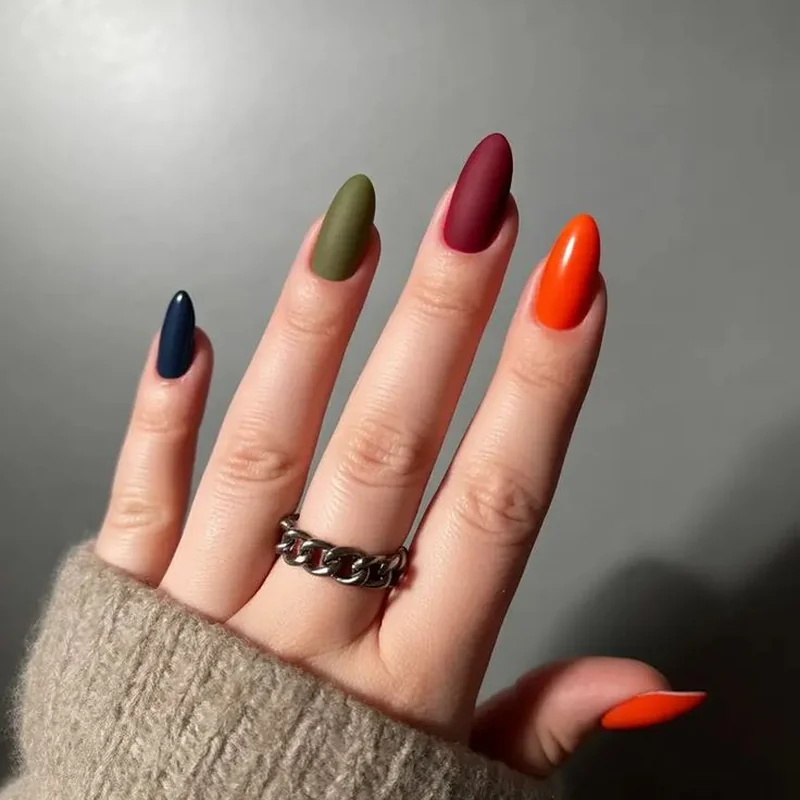 Olive undertone hands wearing rust terracotta earthy nail colors showing perfect color harmony balance