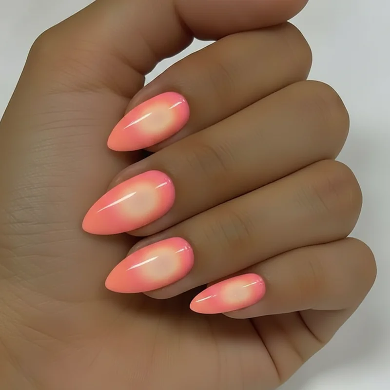 Aura nails summer 2026 multi-colour airbrush technique with coral peach and golden halo layers on milky base editorial tropical palette