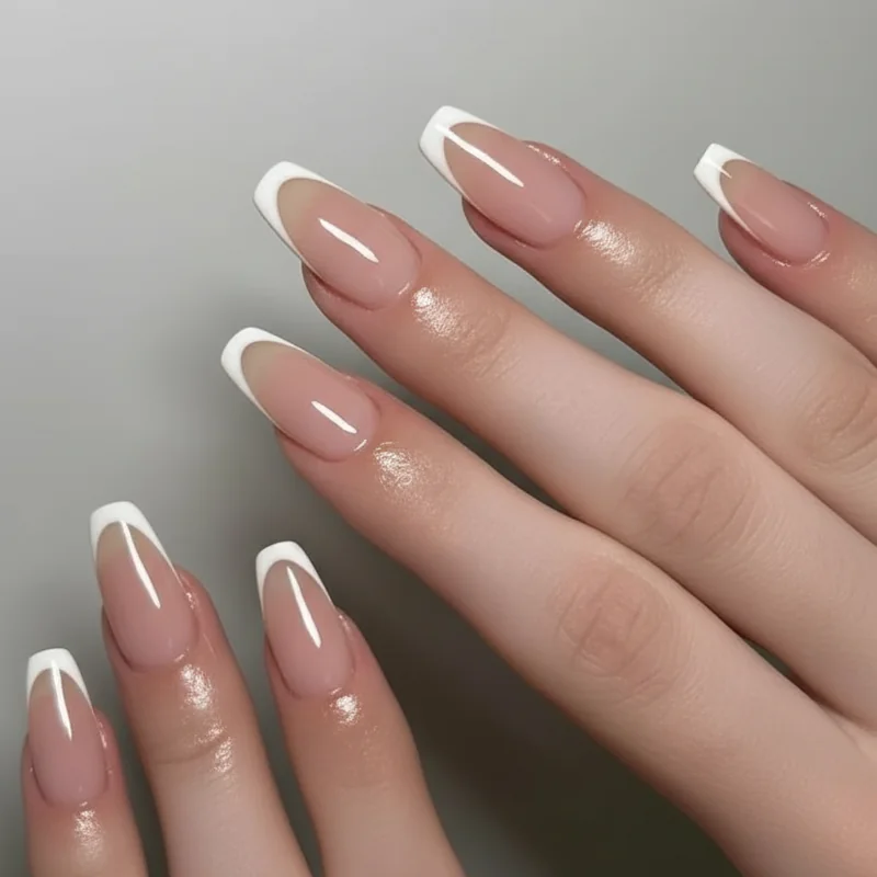 Classic French tip versus micro French tip side-by-side comparison showing tip width difference for professional office manicure in 2026