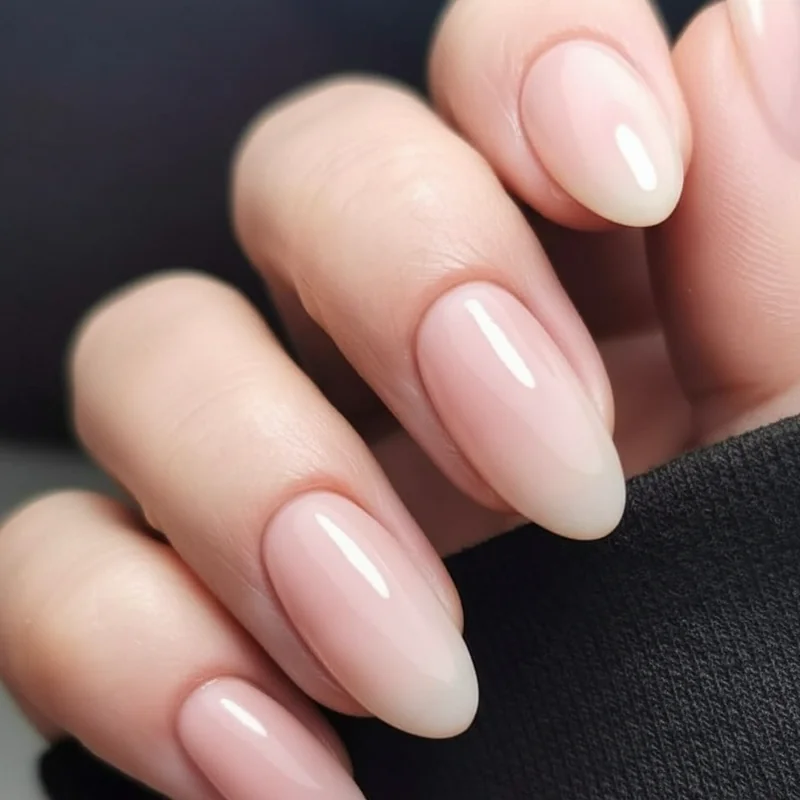 Milky glazed office nails showing sheer soap finish and professional clean girl aesthetic with translucent white depth and high-shine top coat
