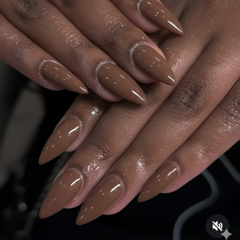 Mocha brown latte professional neutral nails showing quiet luxury office manicure for 2026 with warm earthy depth and glossy sophisticated finish