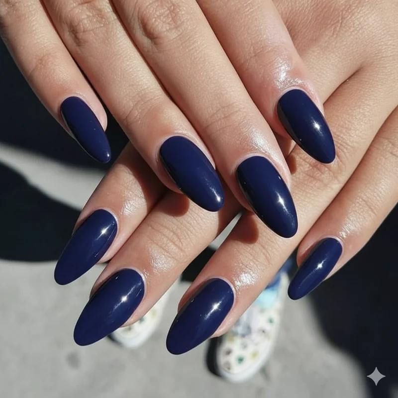 Deep navy mauve and oxblood dark nail shade swatches showing office-professional colour range for corporate women in 2026