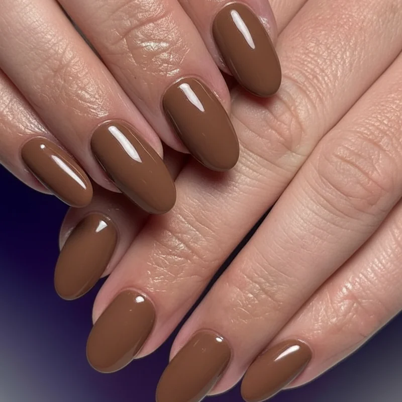 Mocha chocolate and latte brown gel nails on squoval shape with high gloss finish for professional office manicure ideas 2026