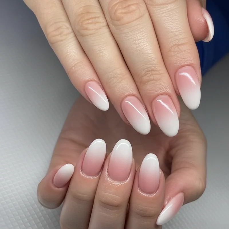 Soft ombre aura nail design in creative workplace showing subtle gradient finish reads professional and polished in 2026