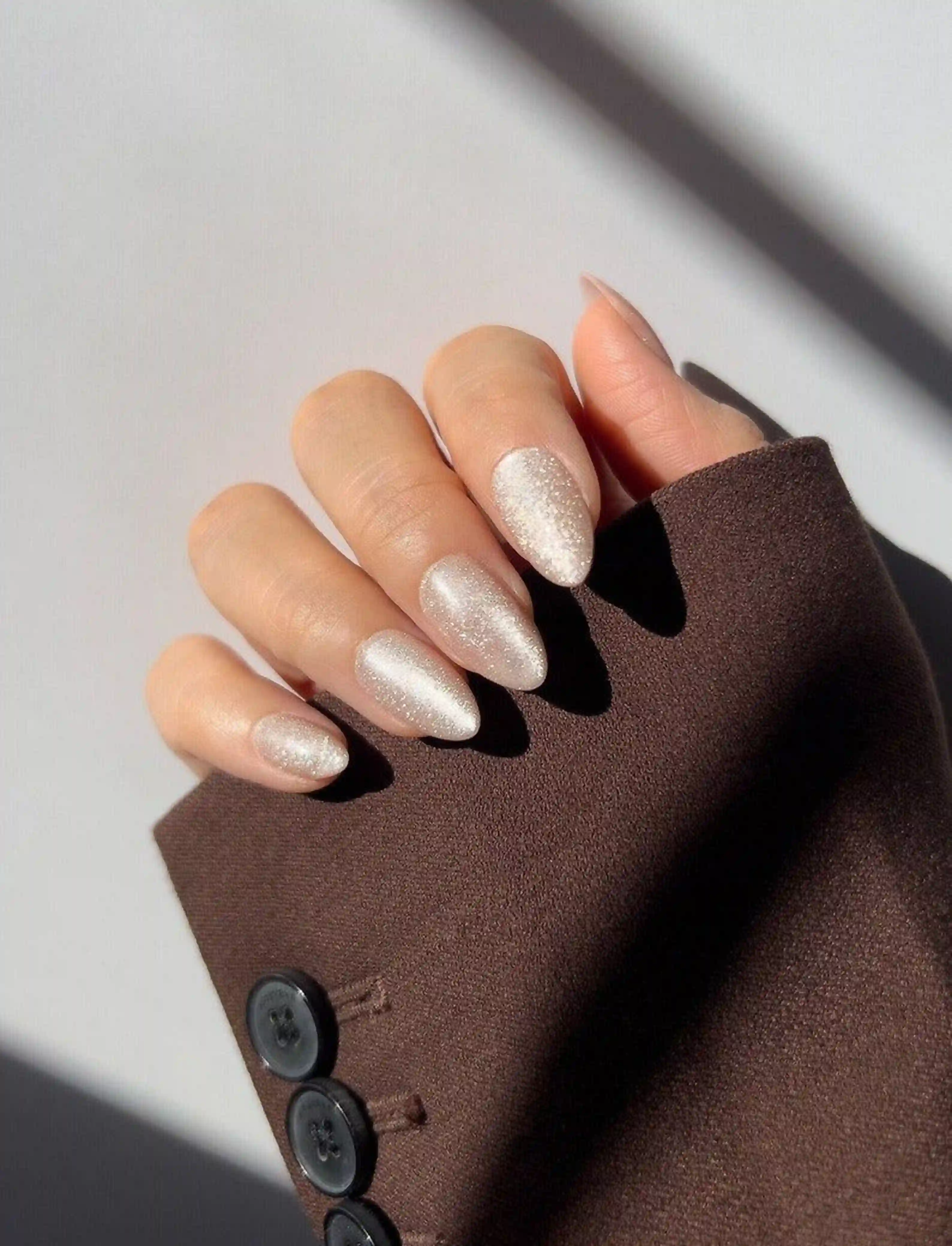 Champagne almond shimmer nails neutral elegant creating wedding bridal luxury manicure for special day