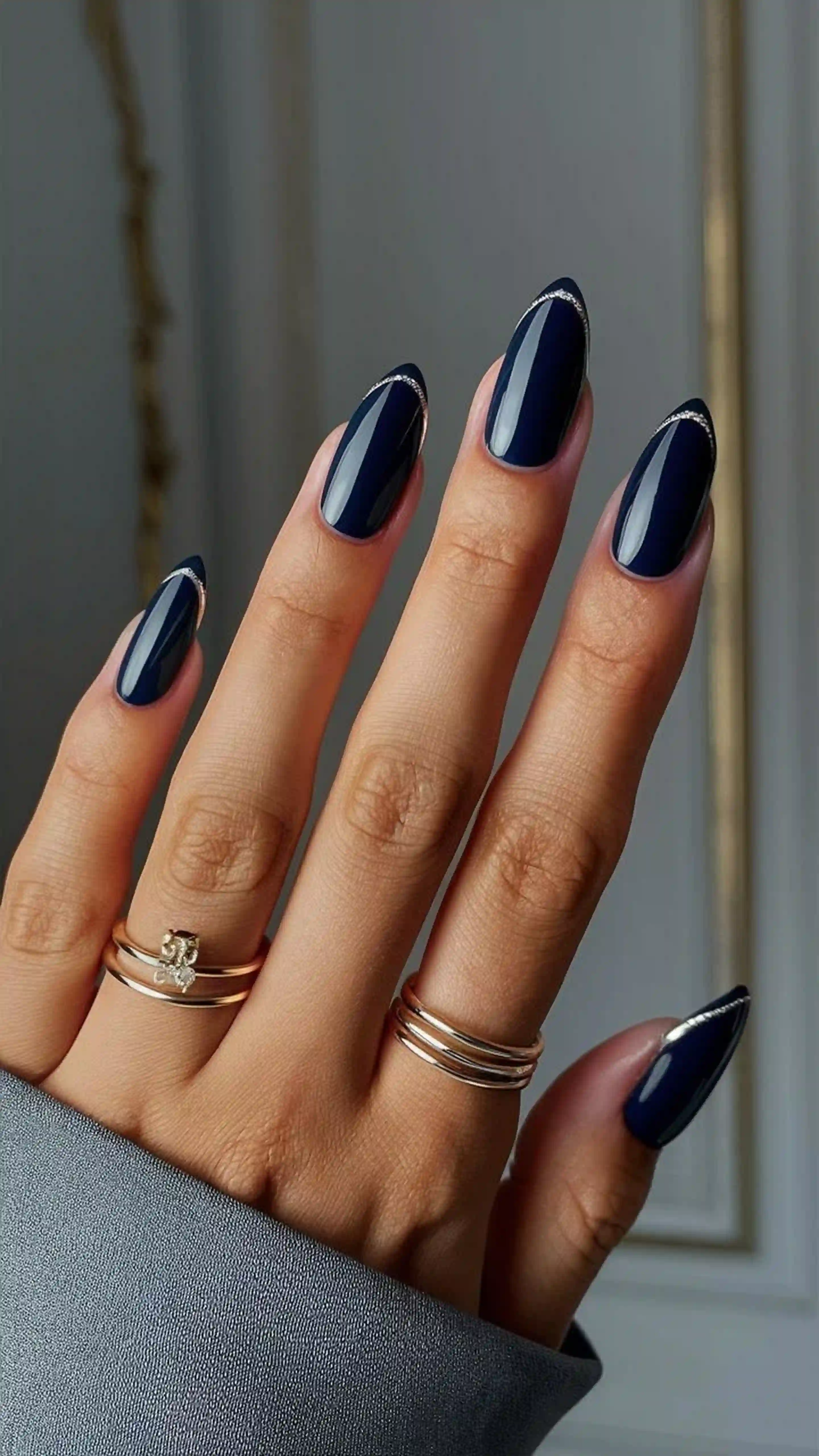 Navy blue almond nails dark sophisticated creating professional conservative manicure for corporate settings