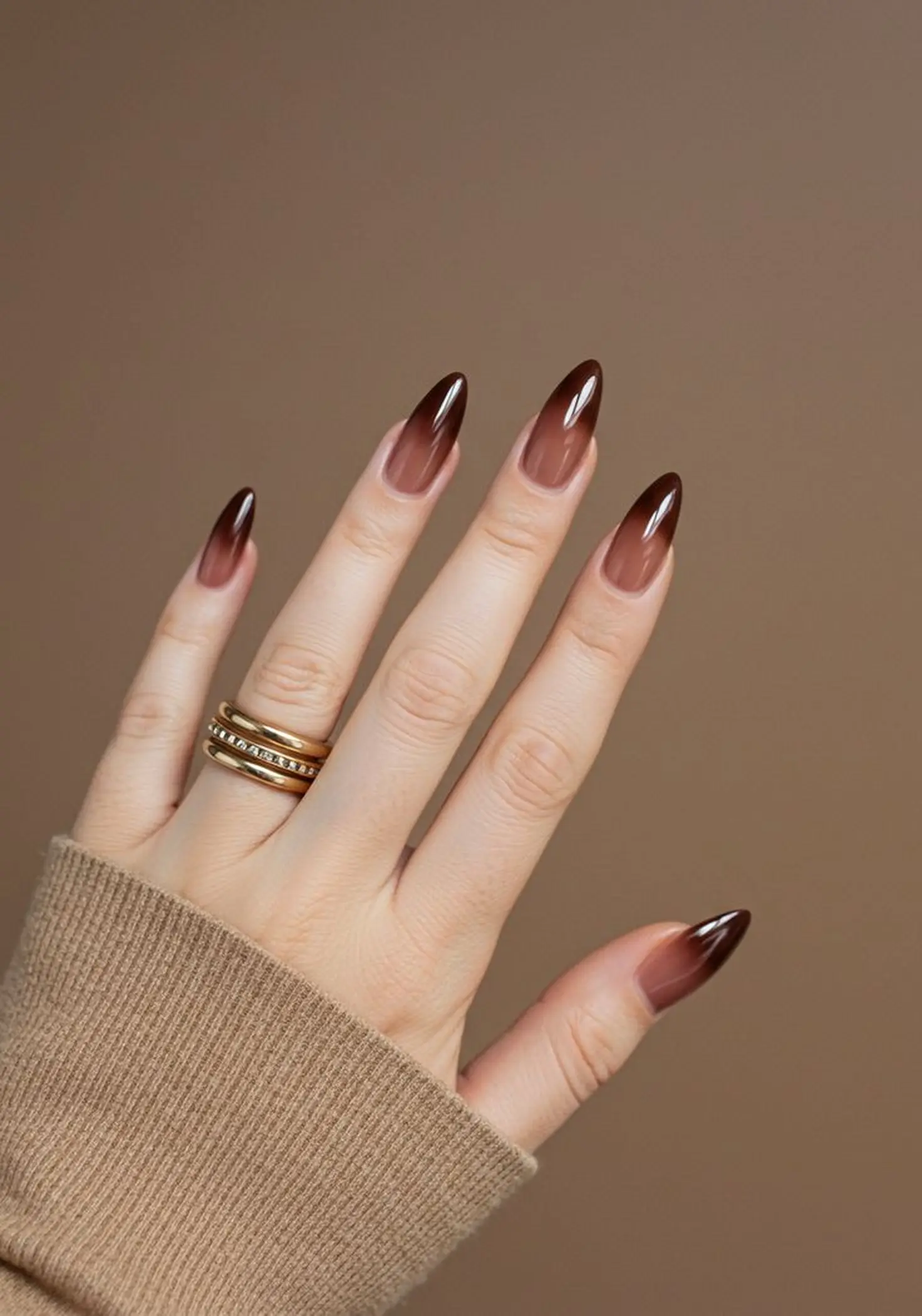 Caramel brown ombre nails with gradient creating warm neutral winter nail art design perfect for cozy season aesthetic 2025