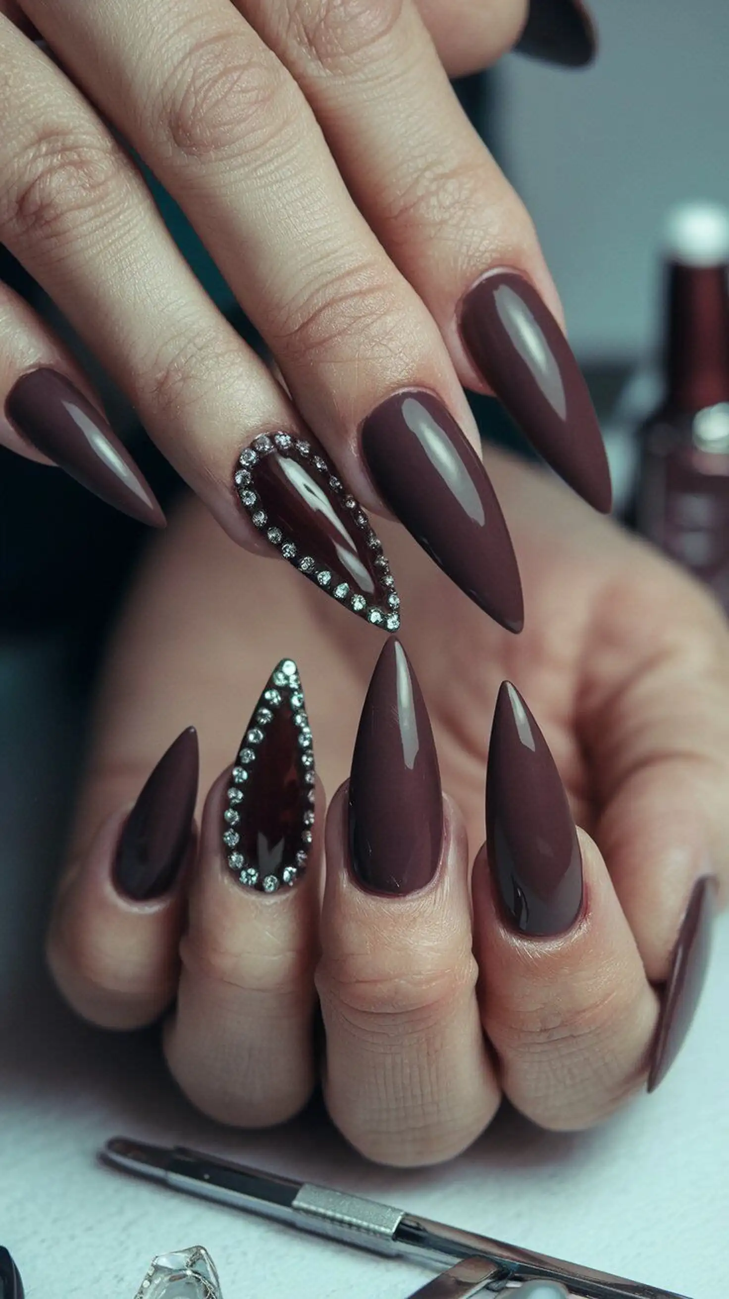 Espresso brown almond nails with dark coffee color creating rich elegant statement winter manicure perfect for sophisticated style