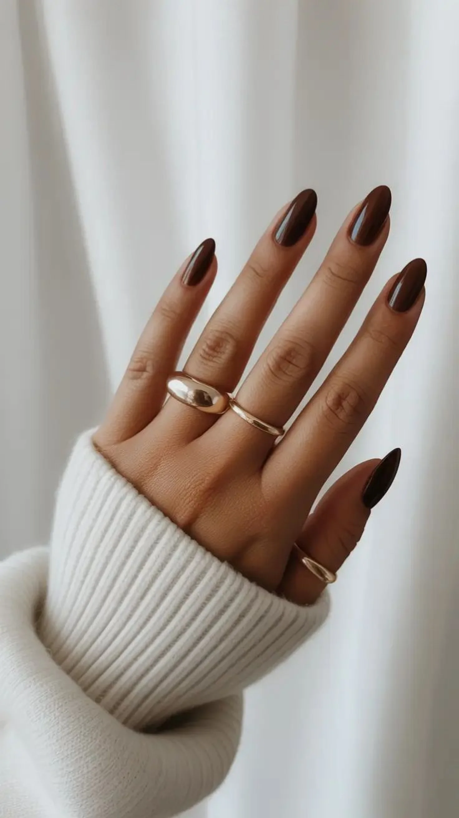 Espresso brown short nails with dark coffee color creating office appropriate chic winter manicure perfect for professional wear