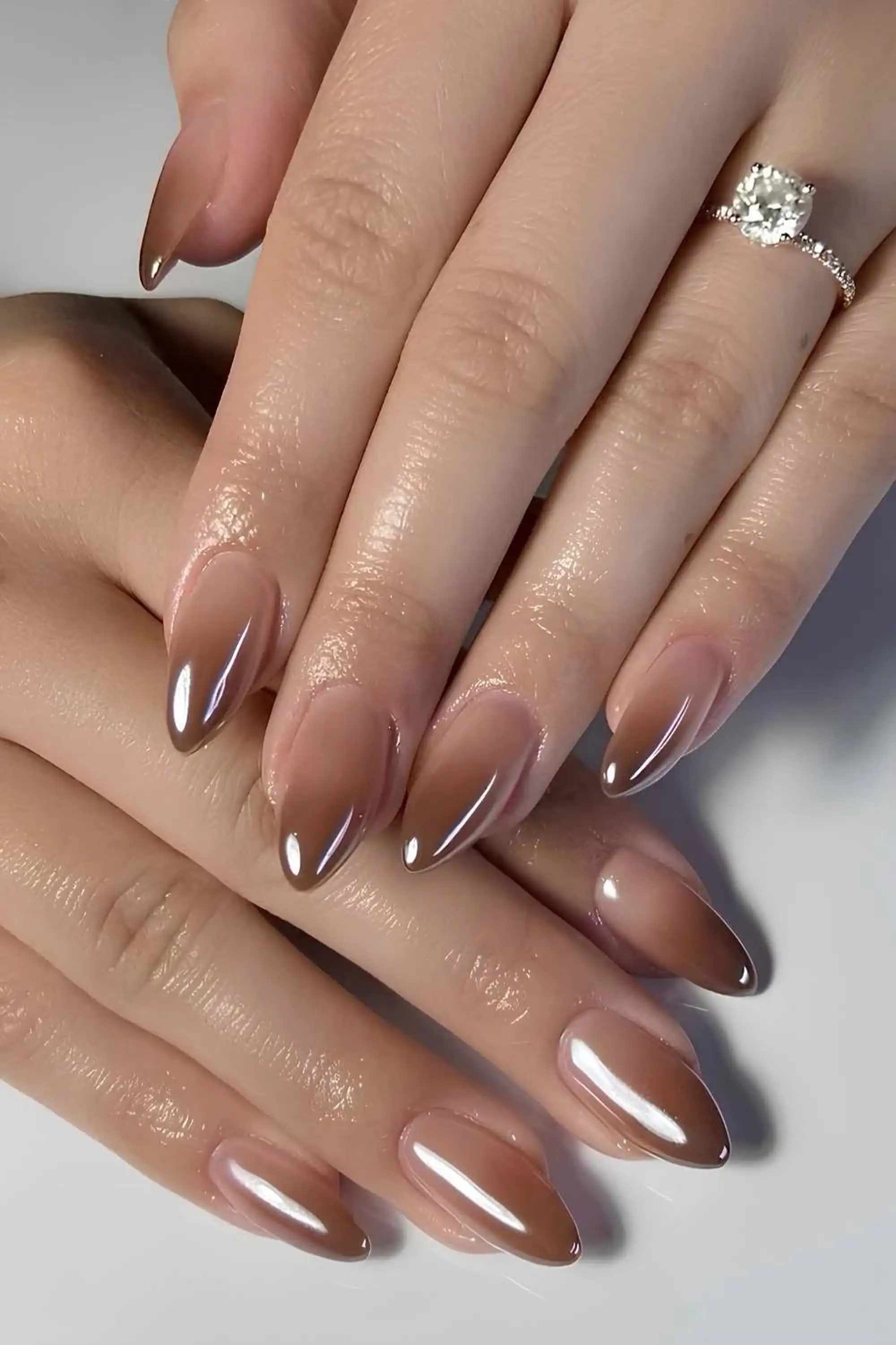 Mocha brown ombre French tips with gradient creating modern elegant winter nail art perfect for sophisticated neutral manicure 2025