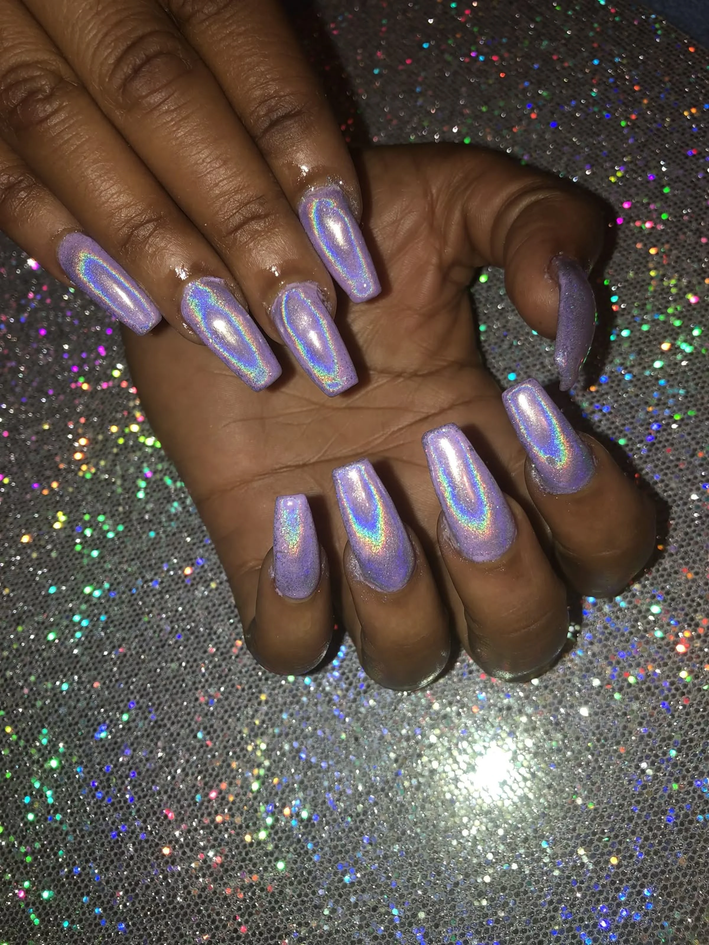 Lavender chrome ombre nails with purple metallic gradient creating dreamy winter nail inspiration with soft color transition 2025