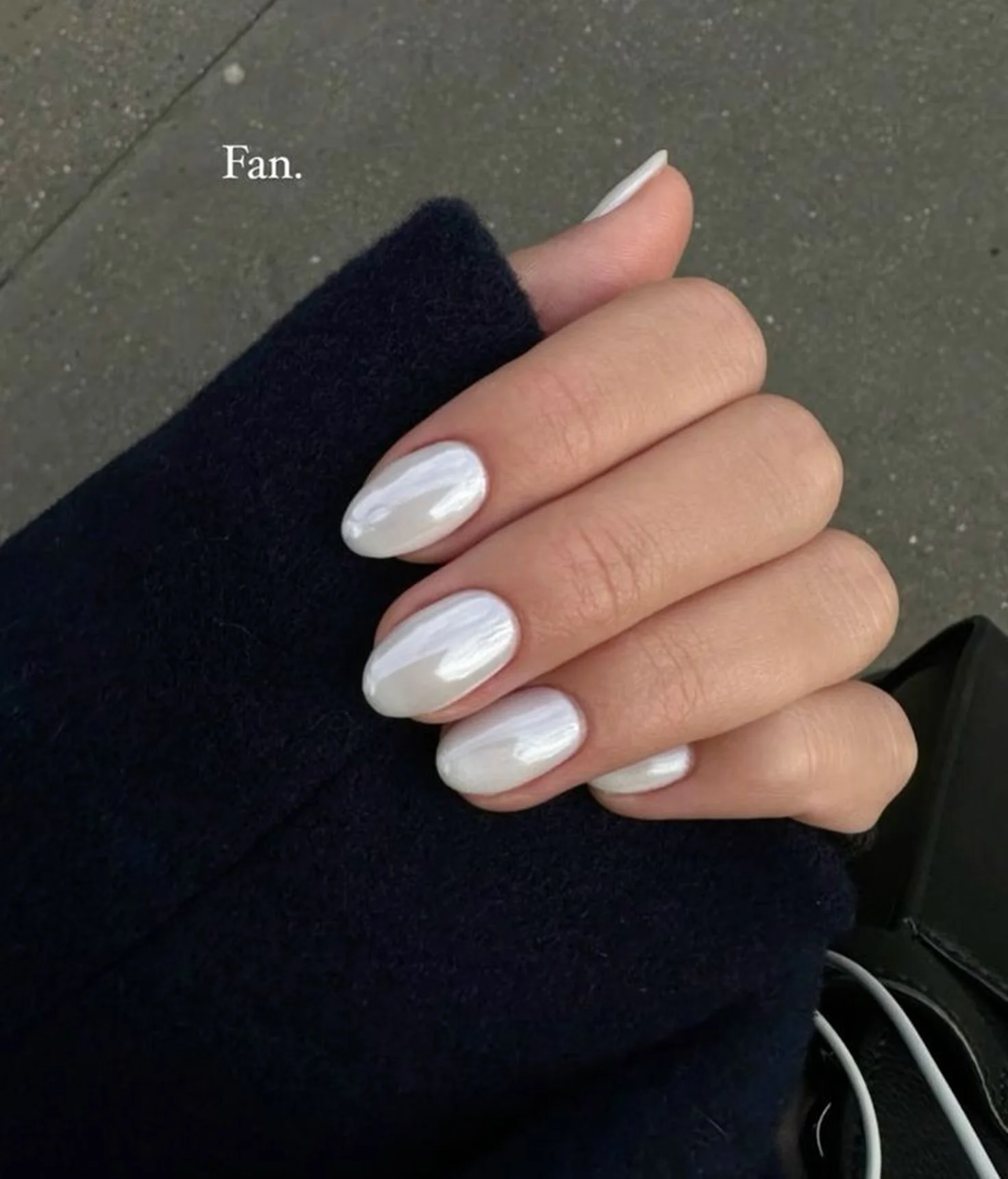 Vanilla chrome nails over white gel base creating soft metallic finish on short length perfect for everyday winter wear