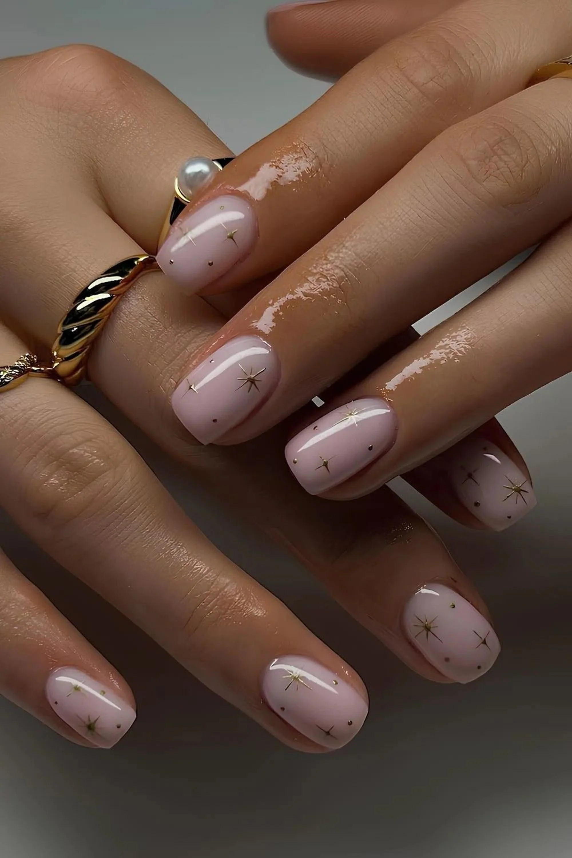 Clean minimal short nude nails creating office appropriate professional chic winter manicure perfect for conservative workplace style