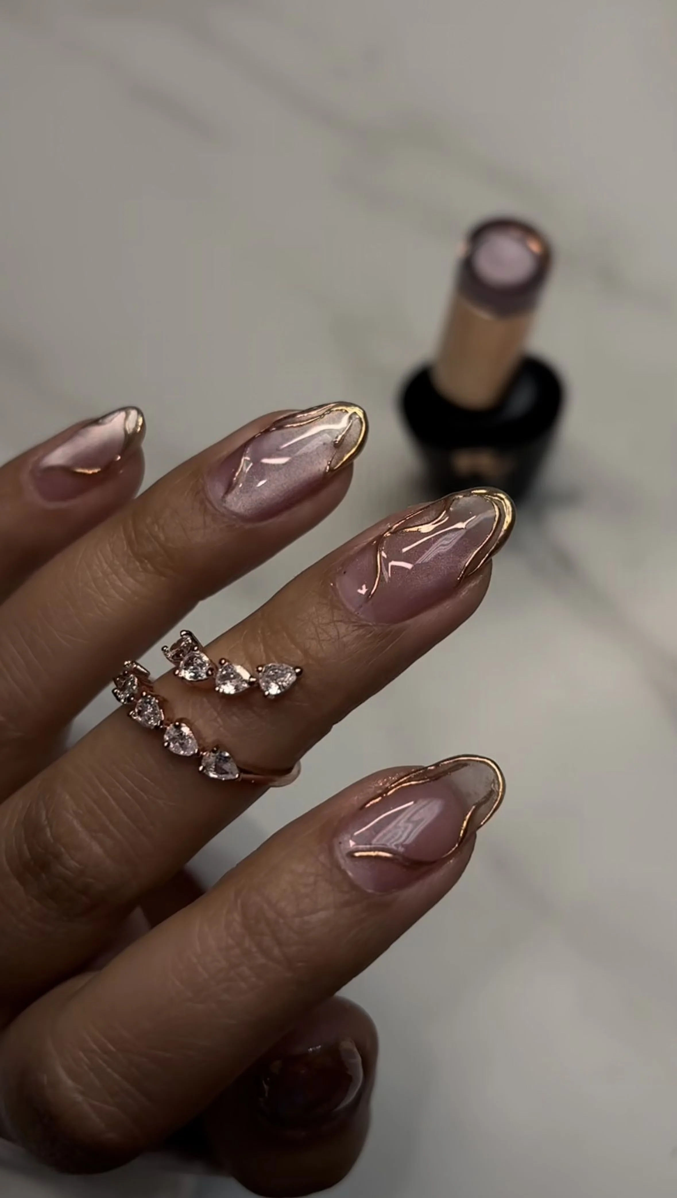 Nude silver micro thin line nails with delicate metallic accent creating minimalist winter manicure perfect for elegant professional style