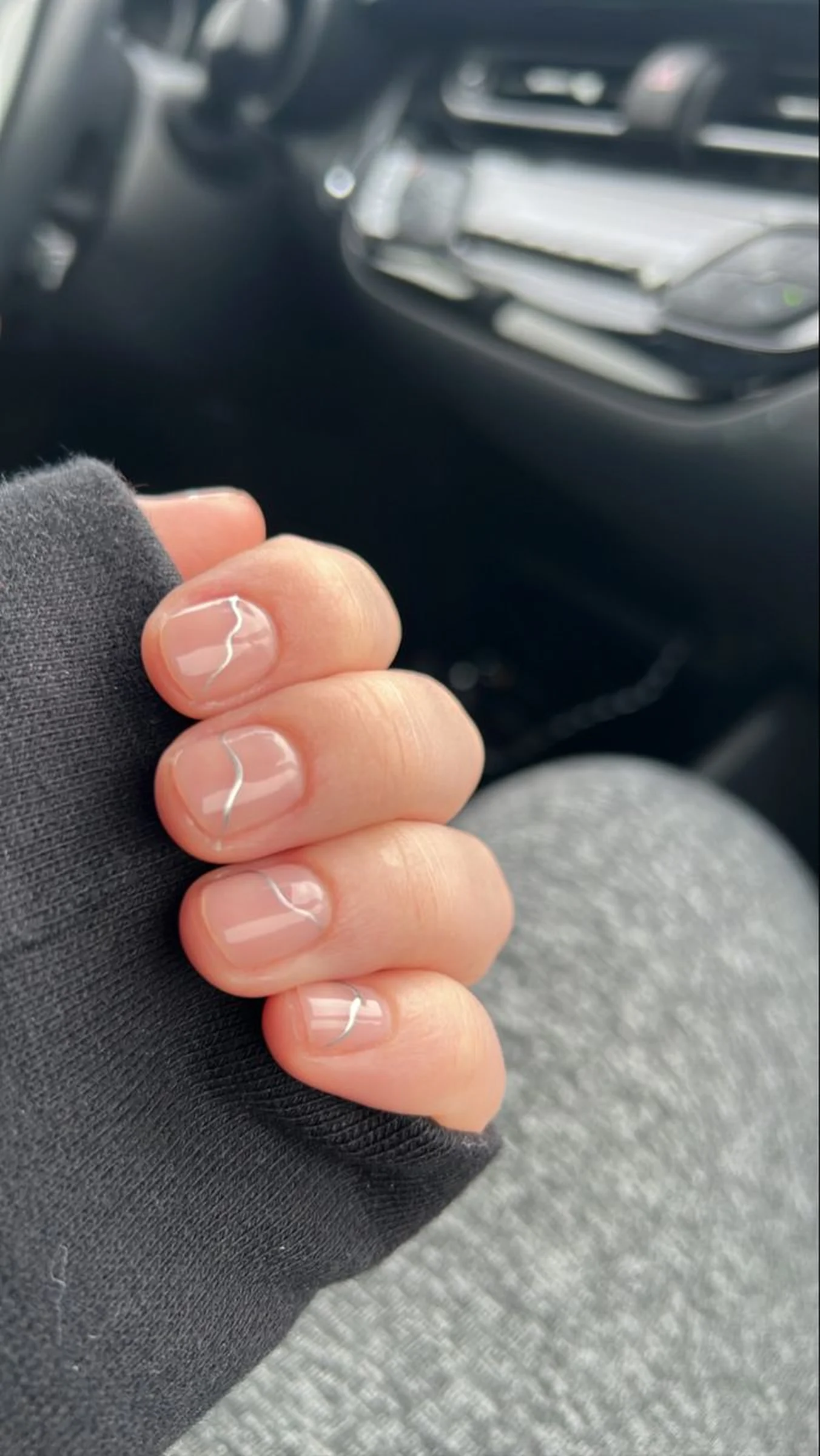 Nude single thin line short nails with delicate design creating office appropriate minimalist winter manicure perfect for professional style