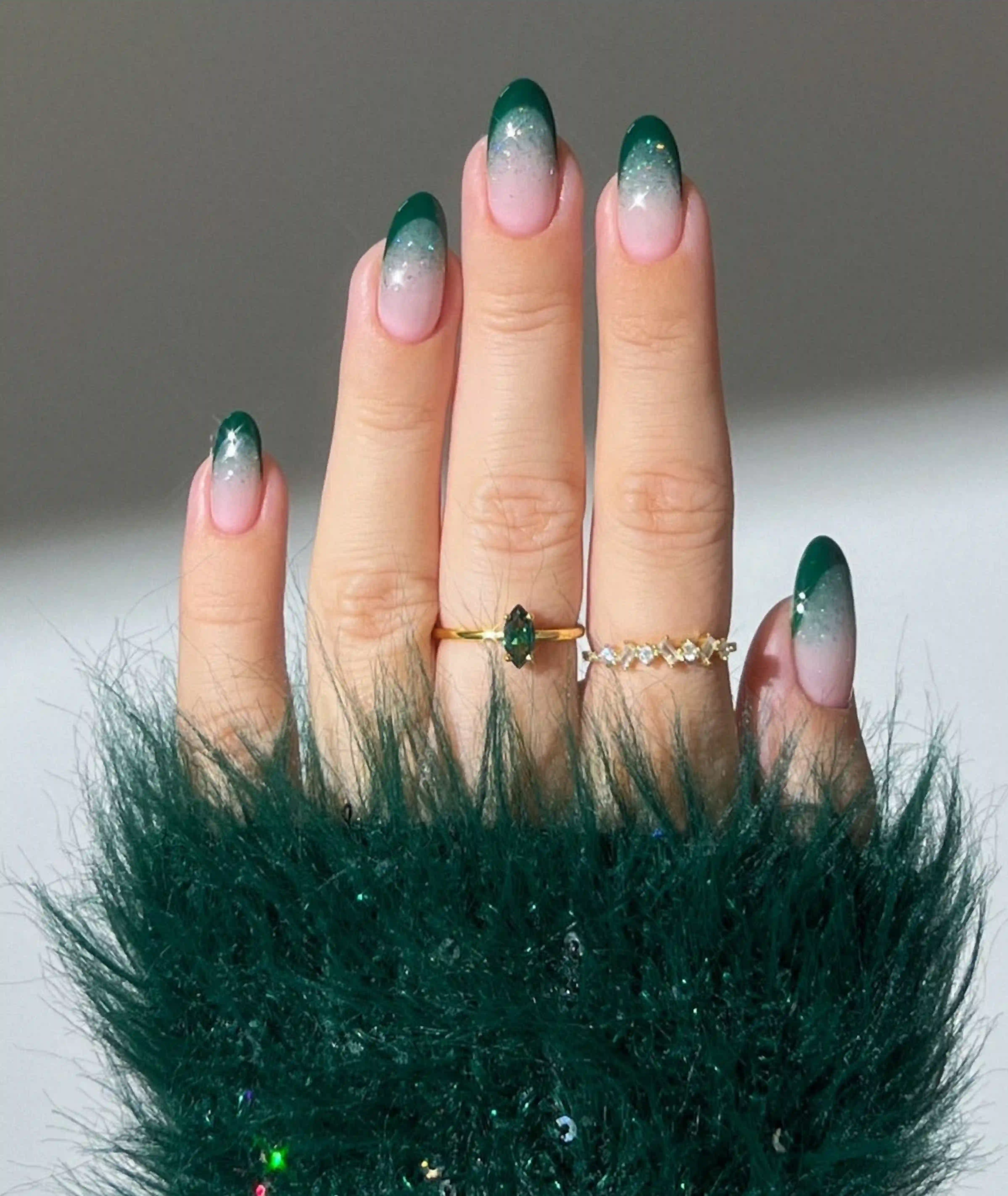 Emerald gold ombre green metallic gradient nails creating luxe elegant sophisticated manicure regal
