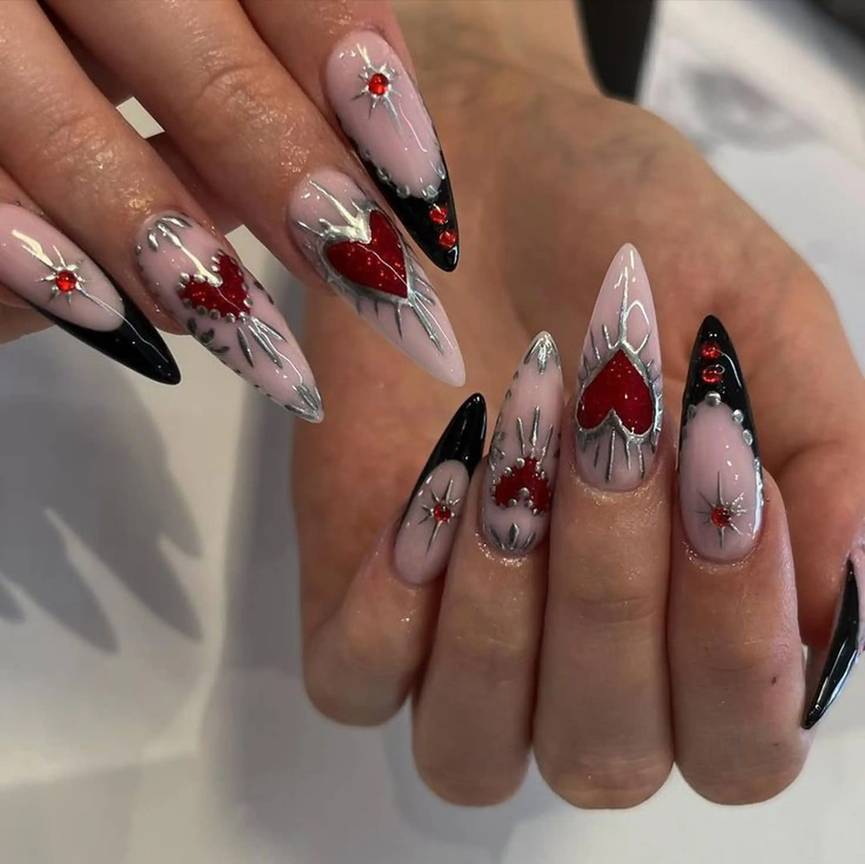 Black red gothic hearts edgy valentine nails creating bold dramatic alternative manicure unique