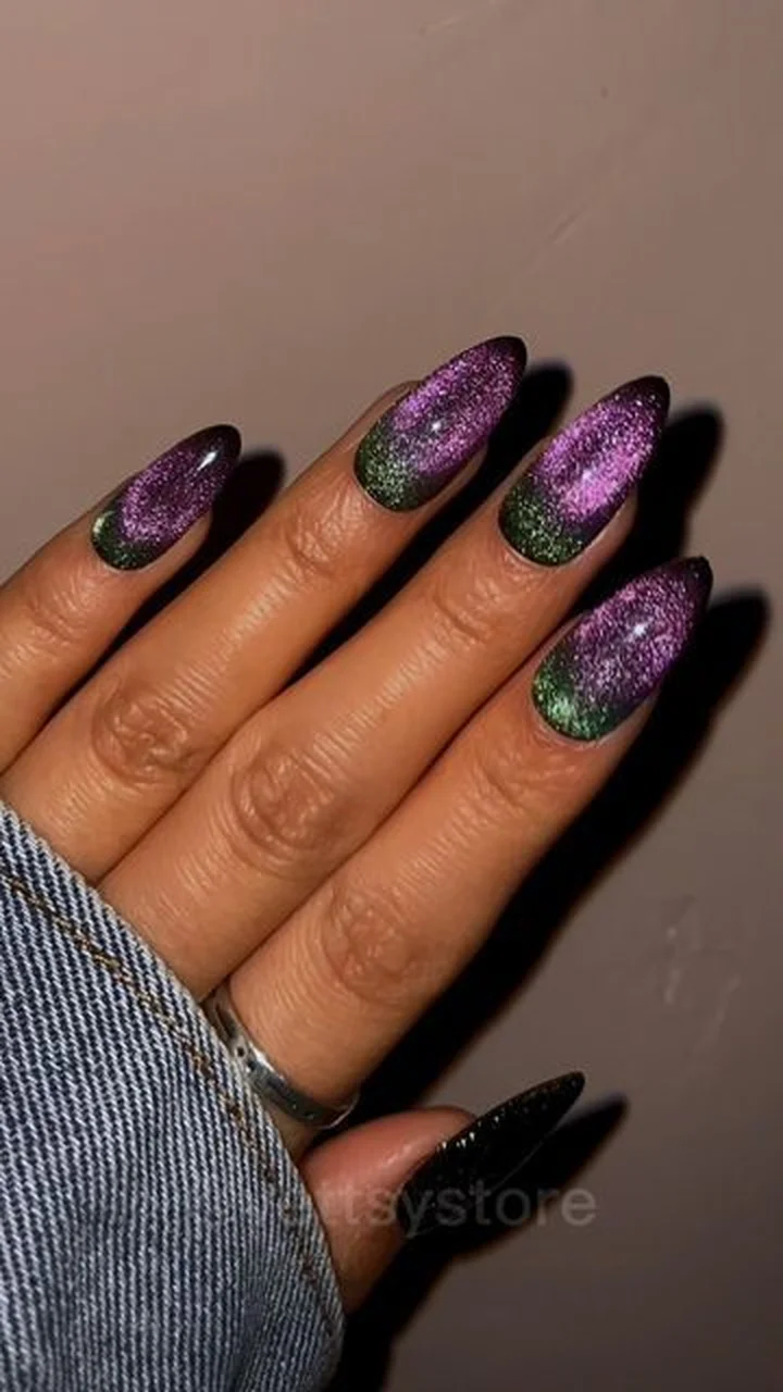 Teal purple ombre cat eye nails with magnetic gradient creating trending winter manicure perfect for colorful bold statement style